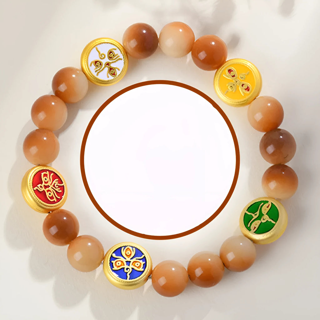 Yellow bodhi seed bracelet with five directions pattern and round geometric design