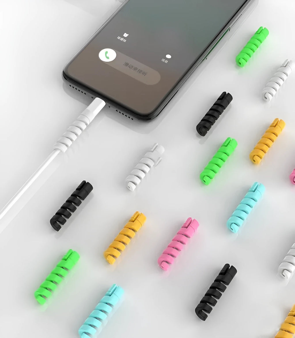 Plastic charging cable protector in various colours, shown next to a USB cable.