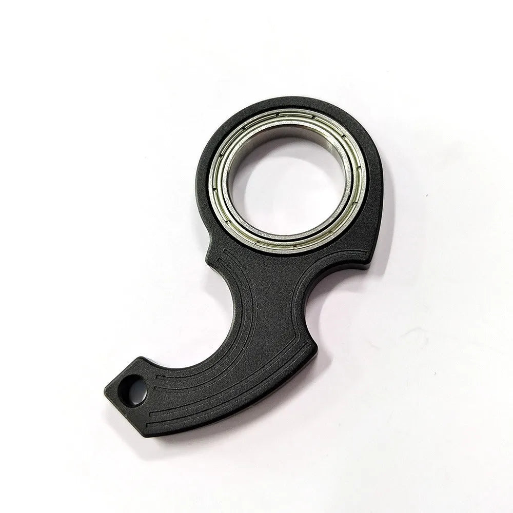 Metal texture rotating keychain in karambit style with key ring in black colour