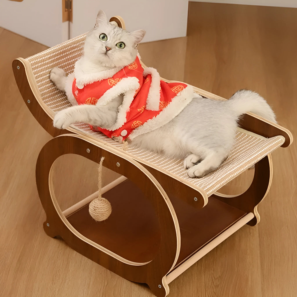 Solid wood cat scratching bed with sisal mat in walnut colour.