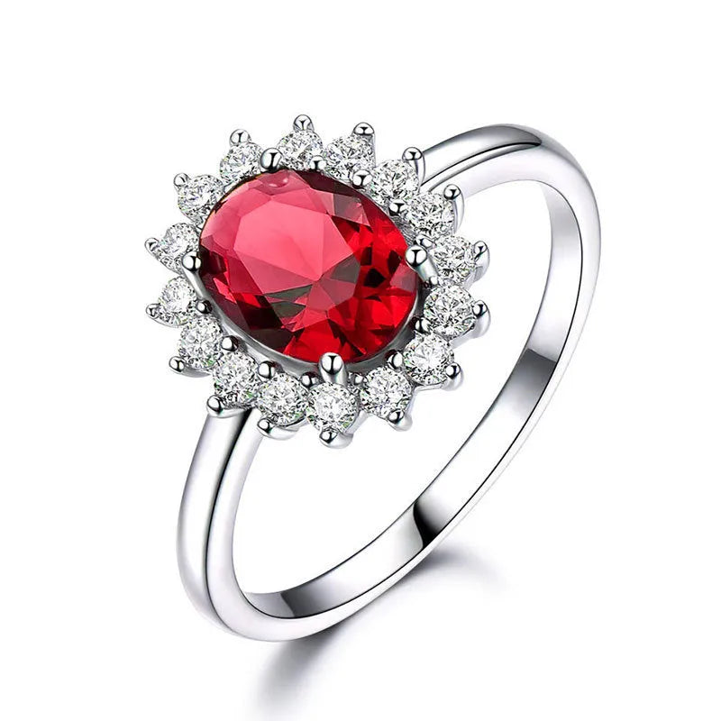 Women's flower-shaped moissanite ring in electroplated copper, shown in sapphire blue colour on a hand.