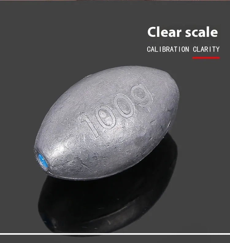 Tongxin olive lead fishing sinker with scale pattern and plastic core in rugby shape.