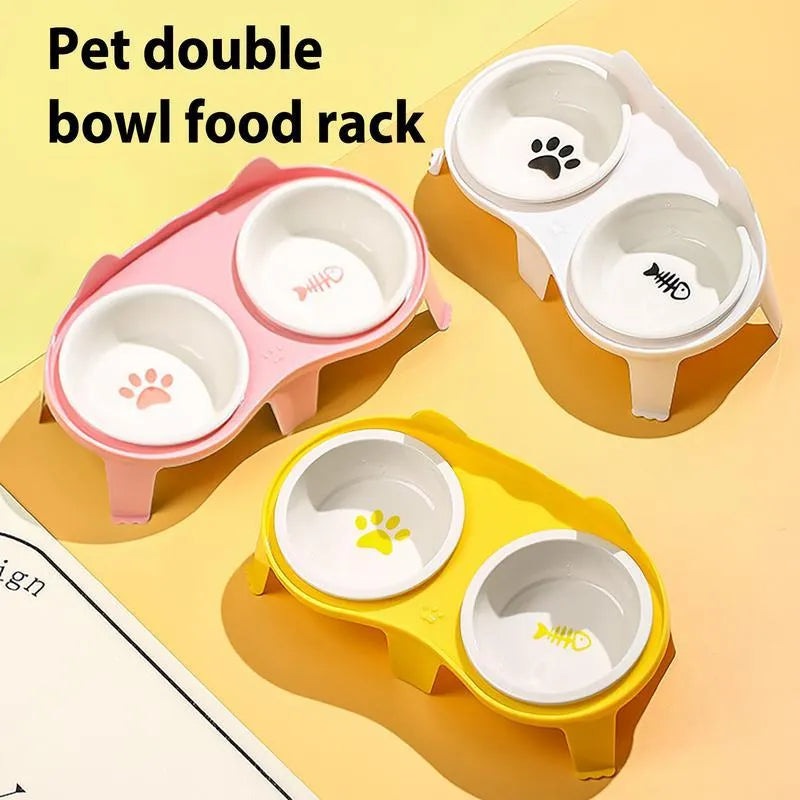 Blue ceramic cat food and water bowls on a white elevated plastic stand with hook design.