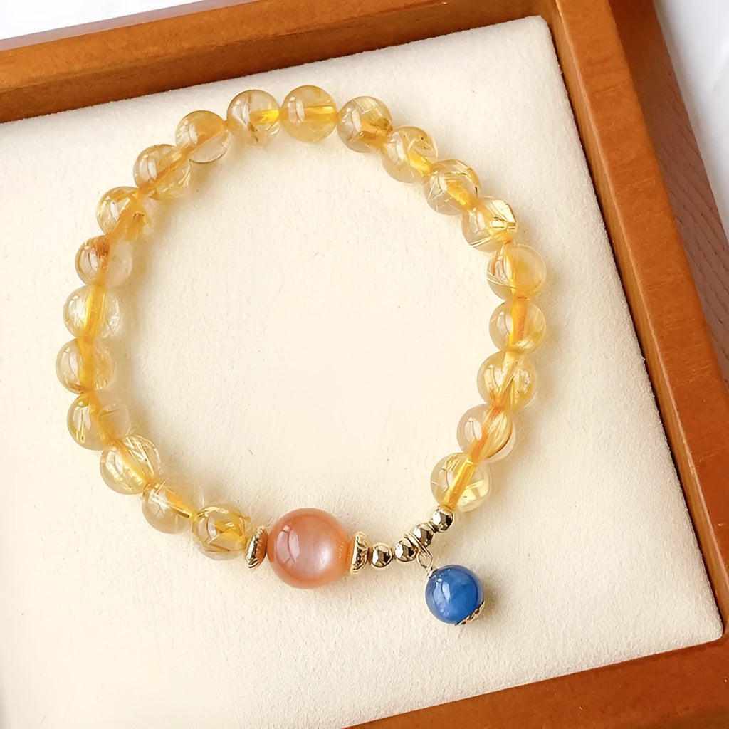 Gold rutilated quartz sunstone crystal bracelet with round diamond-shaped beads