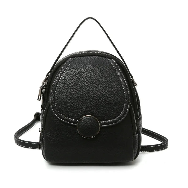 Fashion mini backpack in PU leather, compact 20x23x8 cm size, available in black and brown, with soft handle and zippered interior