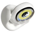 White Atomic Angel shaped induction night light on a surface.