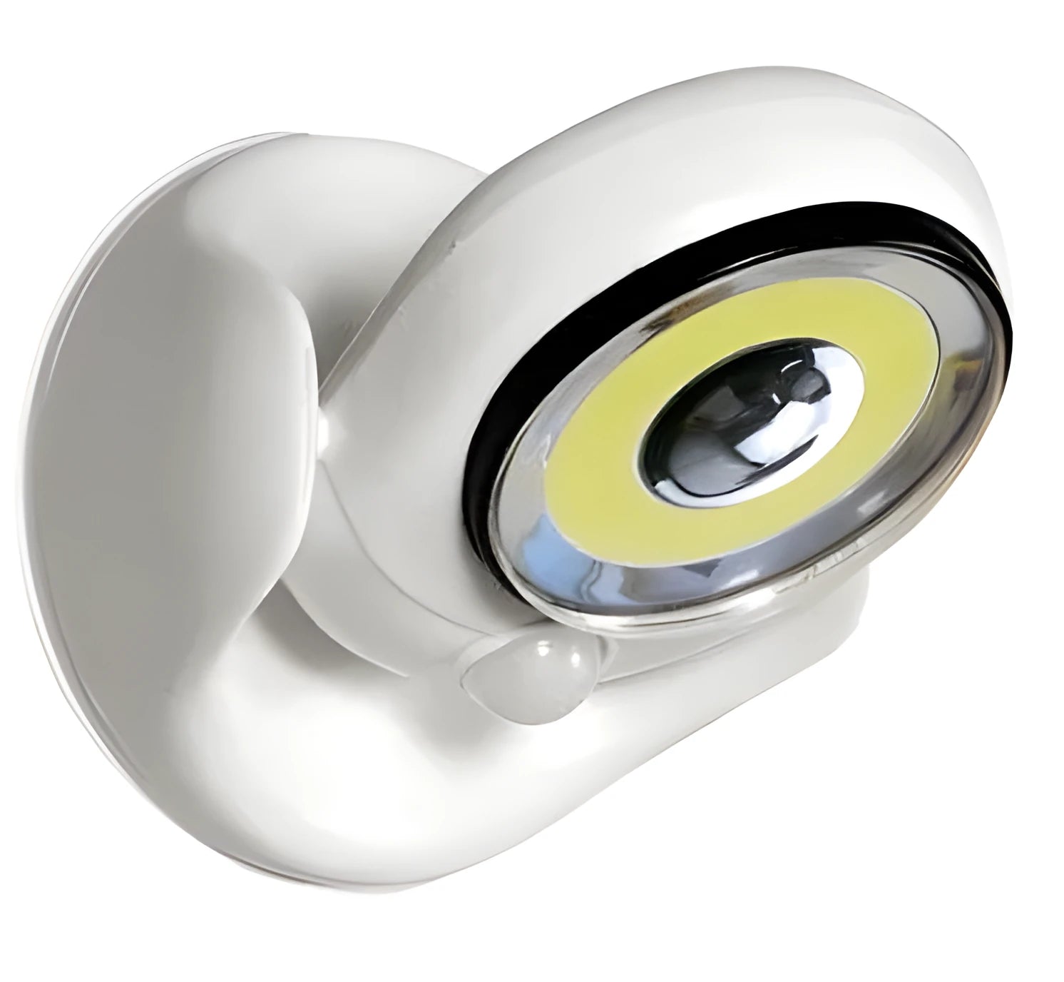 White Atomic Angel shaped induction night light on a surface.