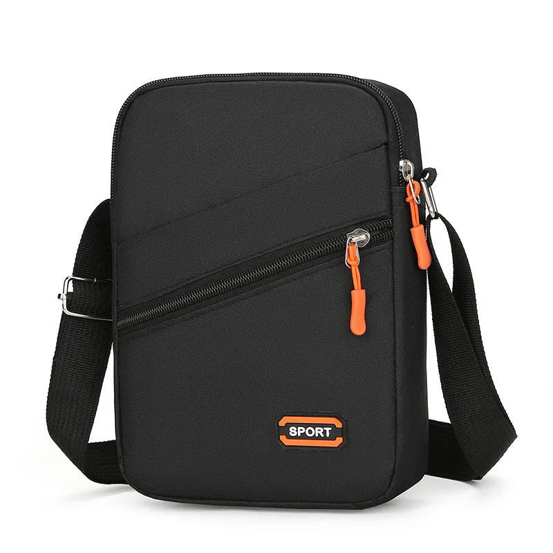 Solid colour Oxford cloth commuter bag with contrast detailing and crossbody shoulder strap