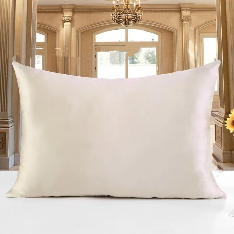 19 M double-sided silk pillowcase shown in one of 14 available colours, including apricot, sky blue, and black.