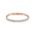 Stainless steel zircon bracelet single row 4mm round full diamond tennis chain in gold finish on white background
