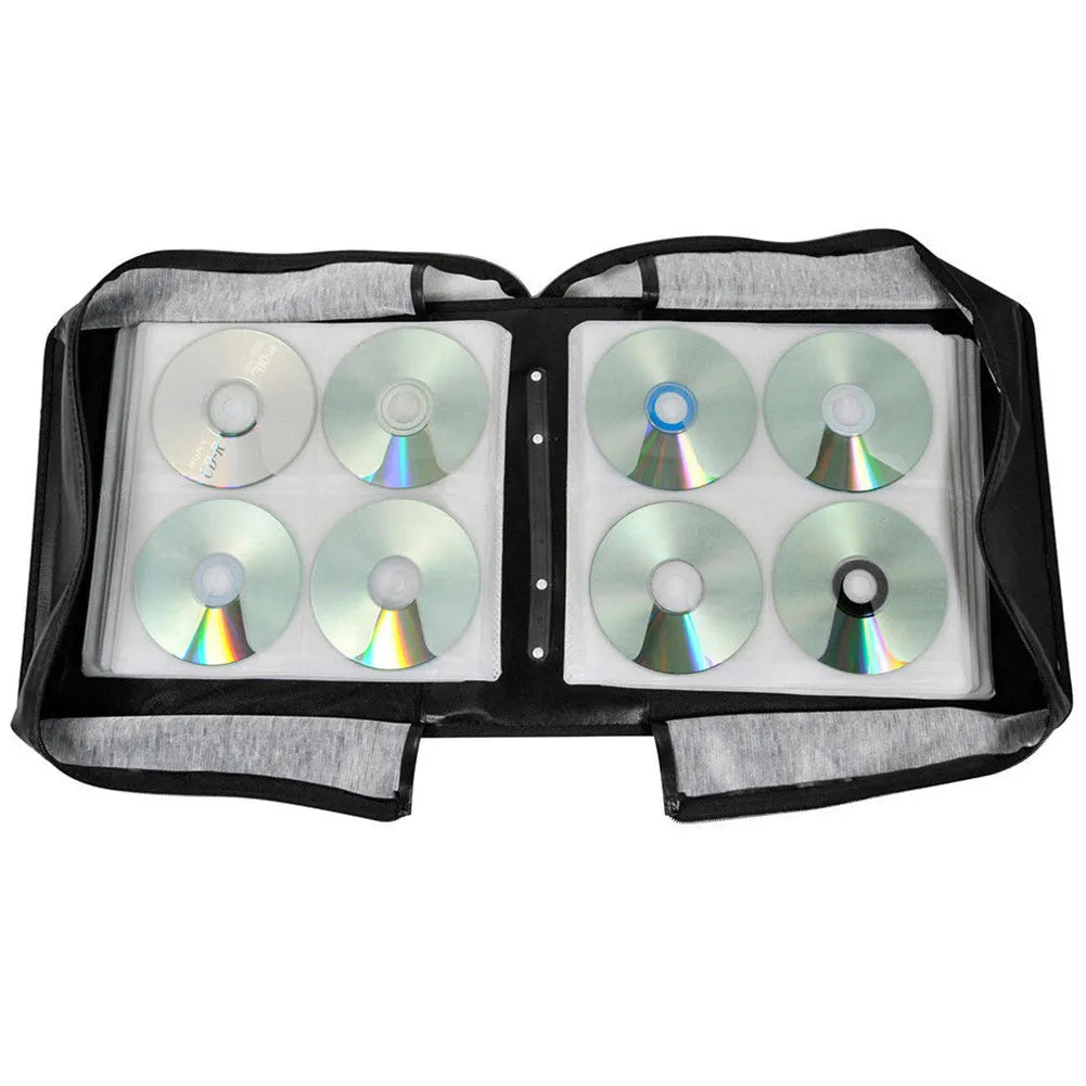 Black Oxford fabric CD DVD storage binder with zipper closure and a top carry handle.