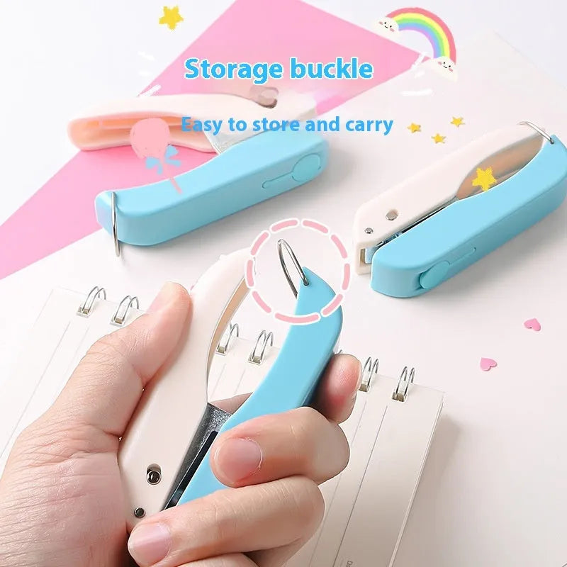 Manual kindergarten pattern punching machine with round, star, and heart-shaped cutters.