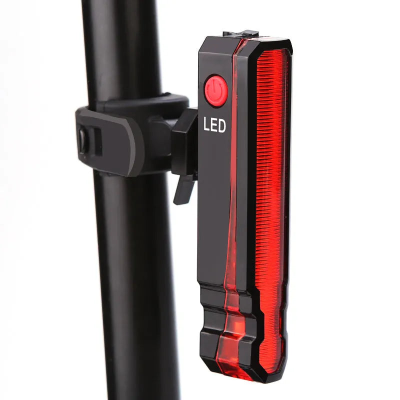 Cycling tail light with laser projection, 150LUX, USB rechargeable, IPX5 waterproof, red colour, silicone mount
