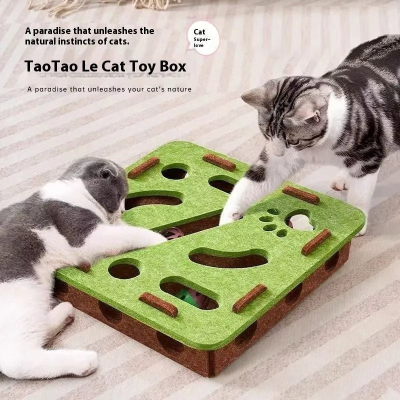 Green brown felt cube cat toy with holes for pet play and boredom relief.