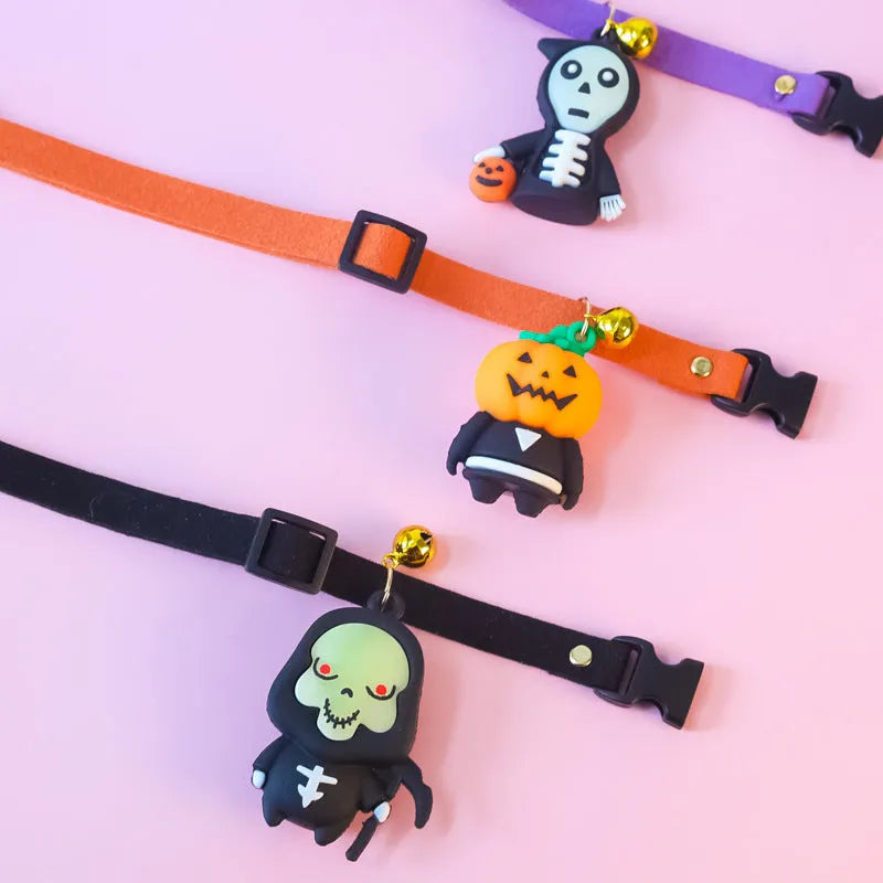 Halloween dog collar with luminous pumpkin man, brat and skull designs in adjustable polyester construction