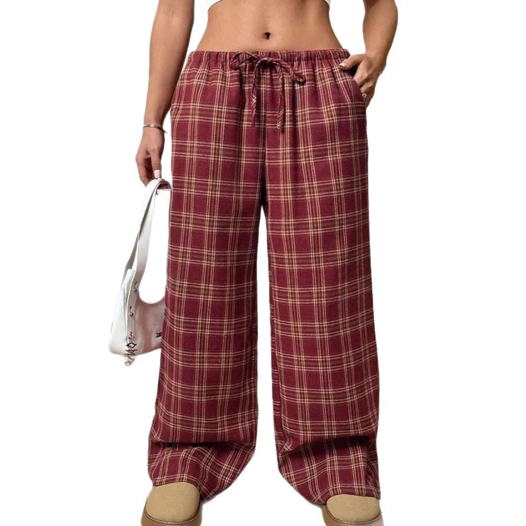 Women's casual trousers with drawstring waist and plaid pockets in red or blue colours