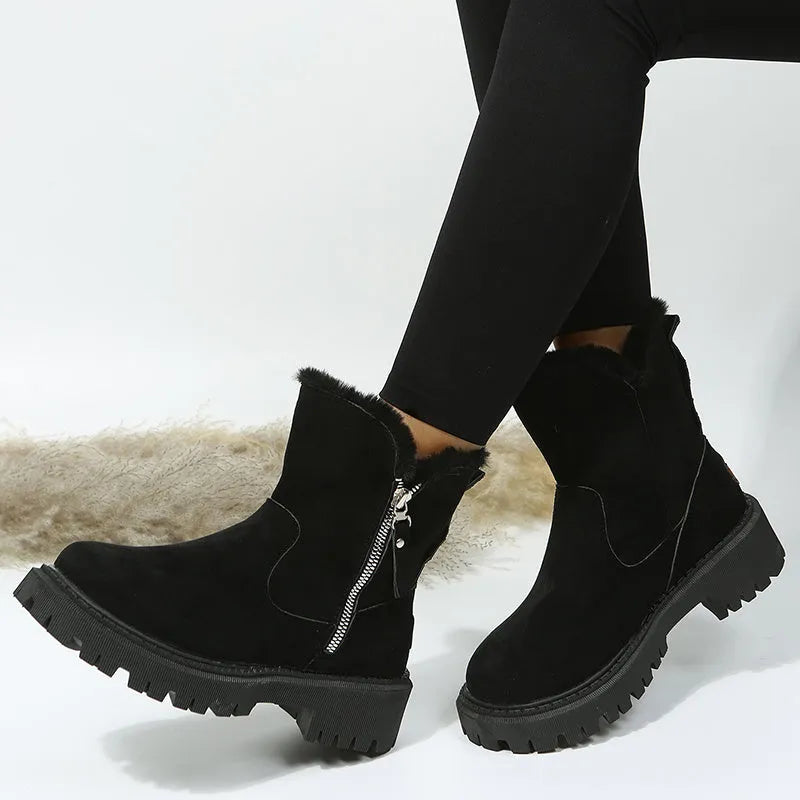 Black women's high-top snow boots with faux suede upper, side zipper, and thick plush lining.
