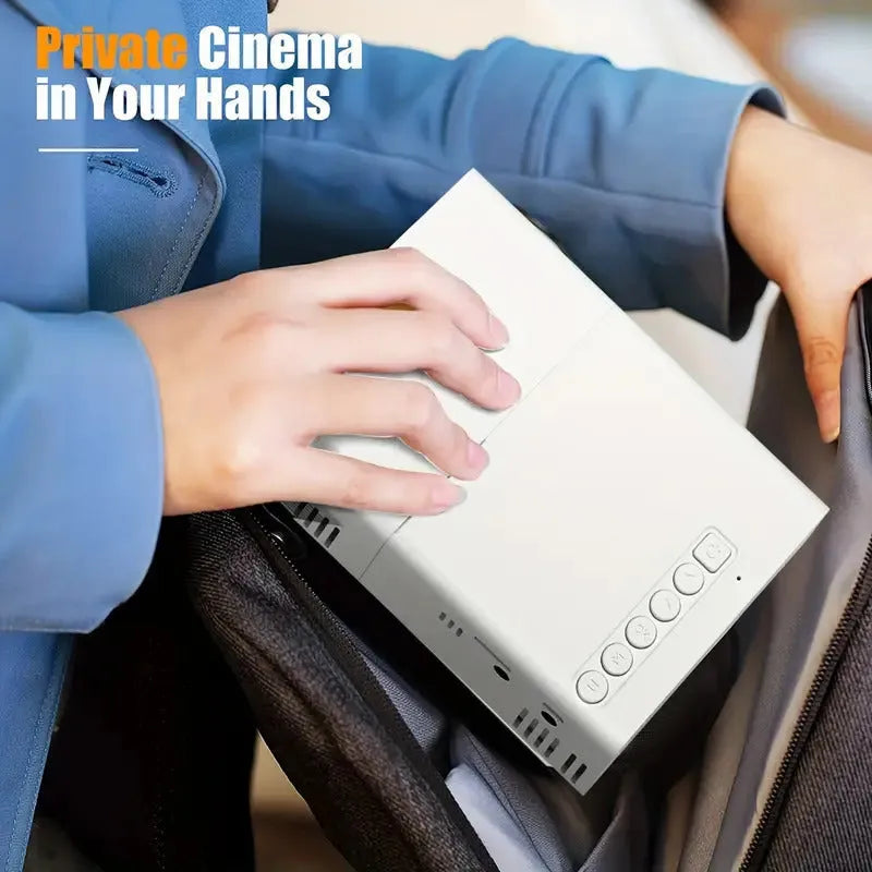 M100 portable LED projector showing black and white colour options with remote control