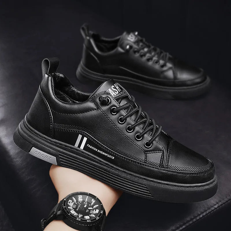Men's low-top white skate shoes with elastic band fastening and a round toe, shown on a plain background.