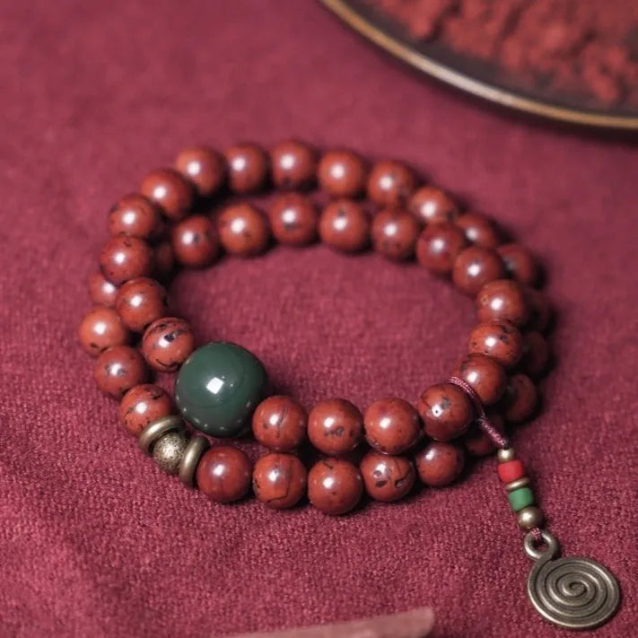 Natural bodhi seed double circle bracelet with cartoon style elements on wrist