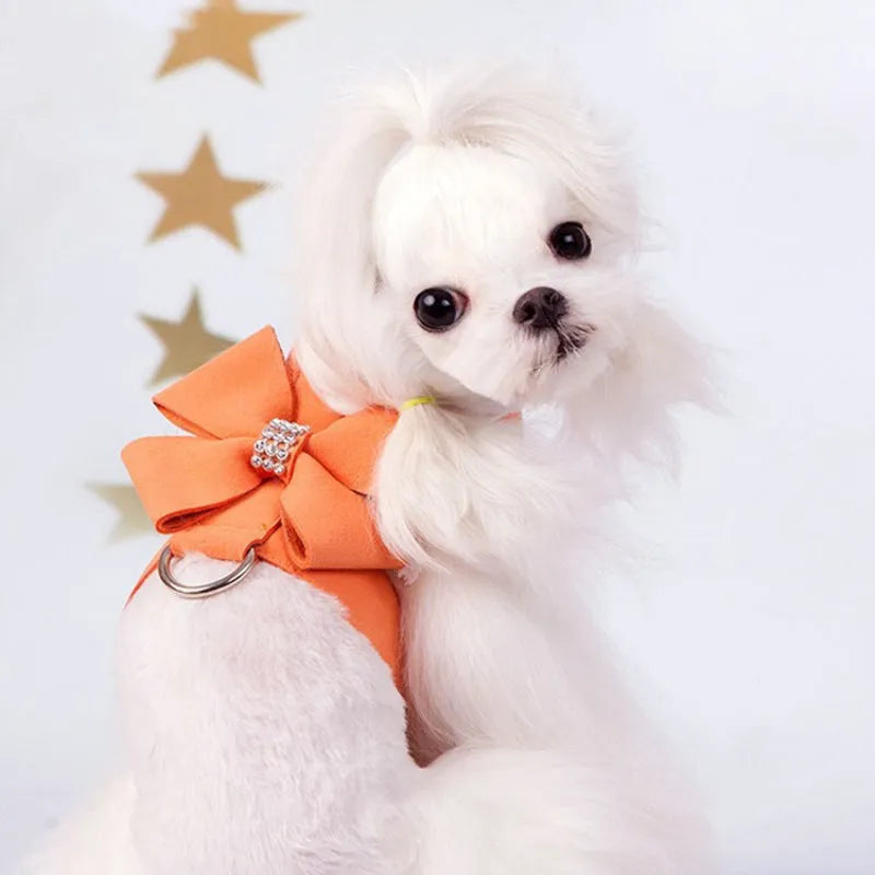 Cute fashion bowknot puppy chest strap in microfiber, shown in pink, blue, and orange colours.