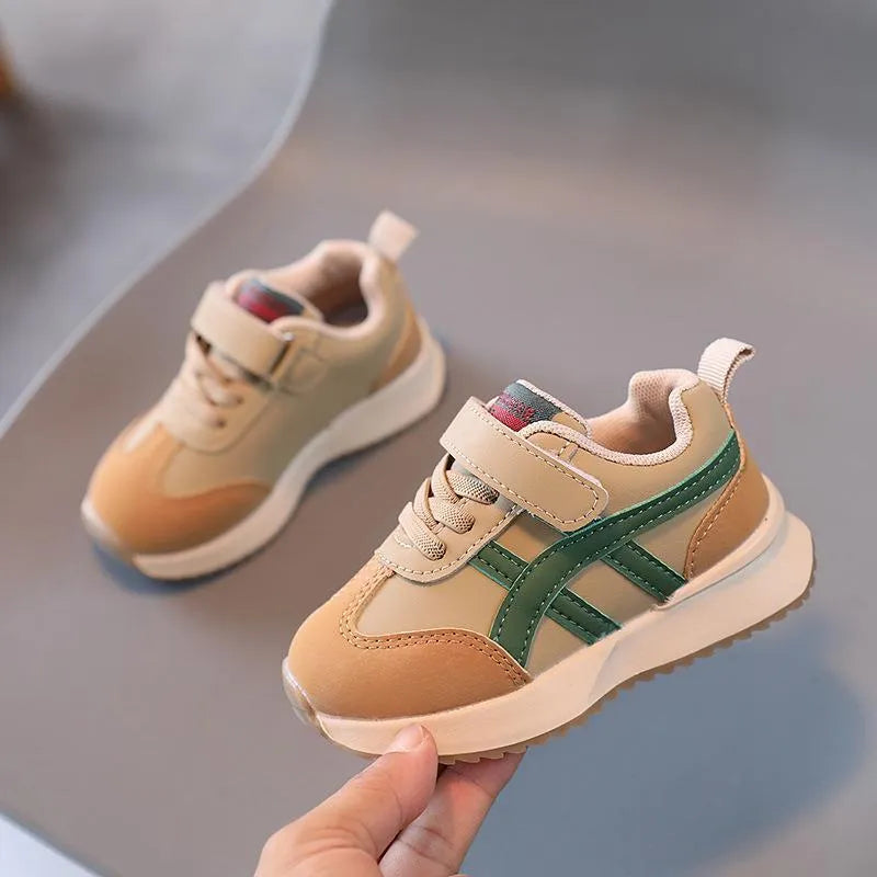 Children's white casual sneakers with Velcro fastening, synthetic leather upper, and rubber sole