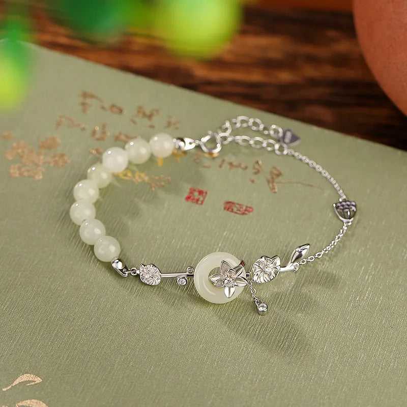 Hetian jade lotus peace buckle bracelet in 925 silver with antique retro design