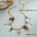 Gold plated stainless steel necklace with geometric leopard, heart, and flowers pendant on adjustable chain