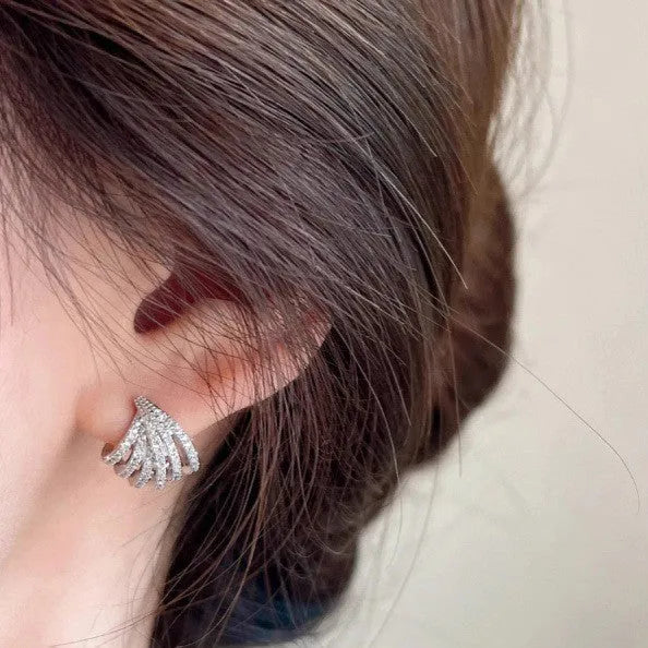 Women's geometric line design earrings with platinum electroplating and zircon construction