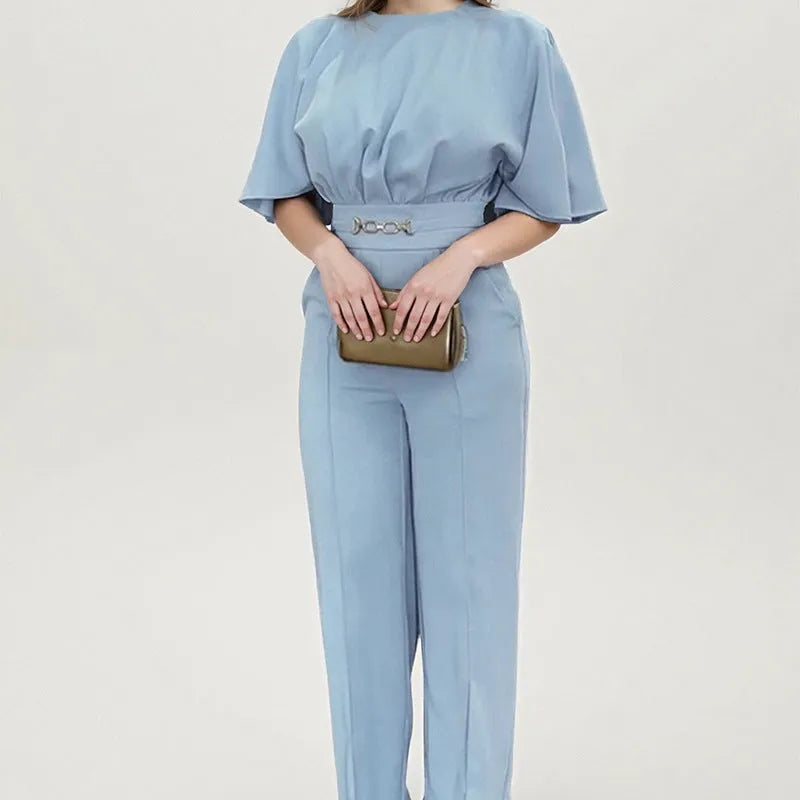 Blue men's polyester suit set with trousers and a long-sleeve top on a mannequin.