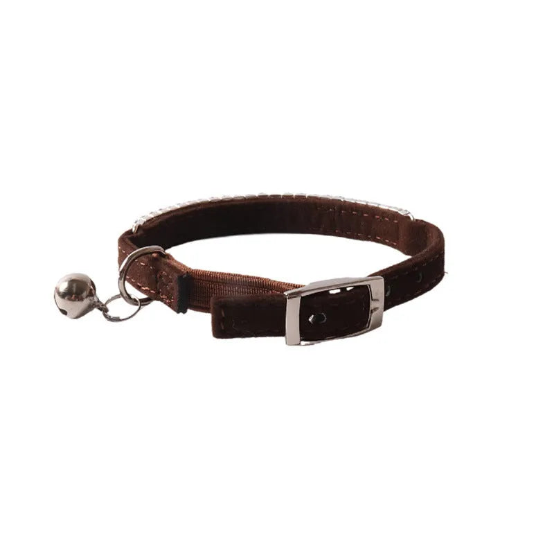 Soft flannel elastic cat collar with a quick-release buckle in pink, shown on a white background.