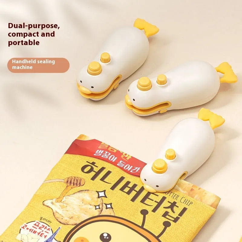 Yellow duck-shaped rechargeable handheld fabric sealing machine with charging cable