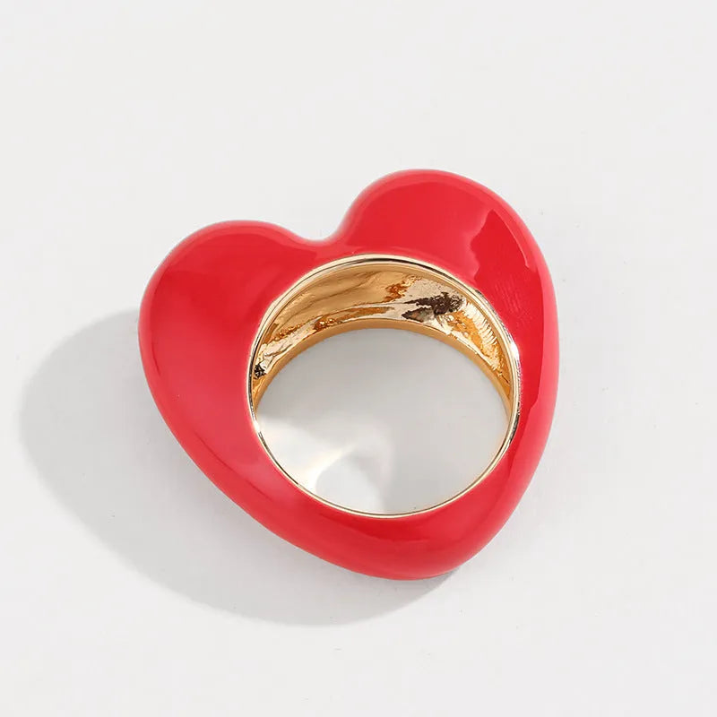 Three-dimensional enamel heart ring in black, pink, purple, or red colour options