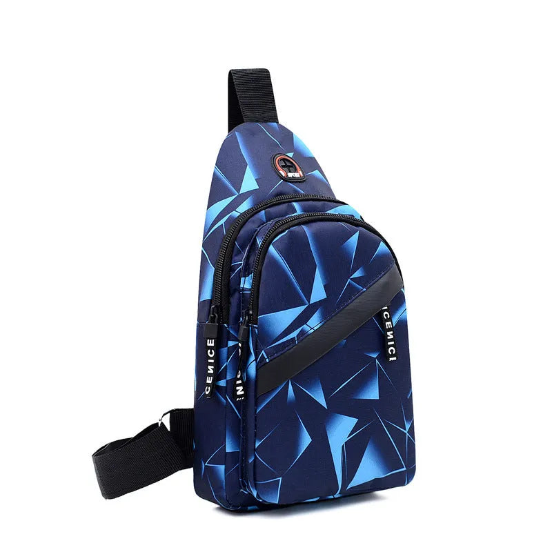 Medium blue crossbody chest bag for men with a visible earphone hole and zipper opening.