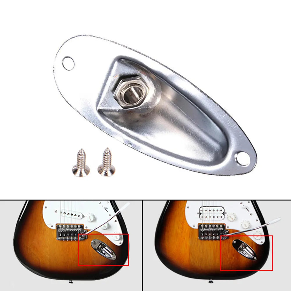 Black and silver alloy ST boat output socket for electric guitar and bass, shown next to a ruler for scale.