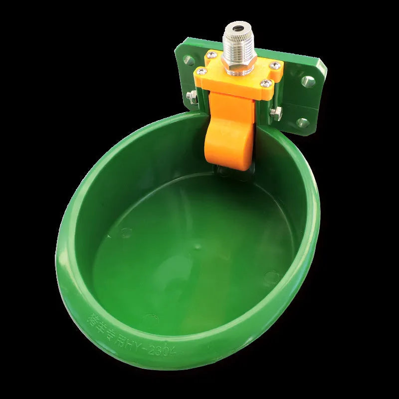 Green plastic drinking bowl for sheep with specialised nozzle design