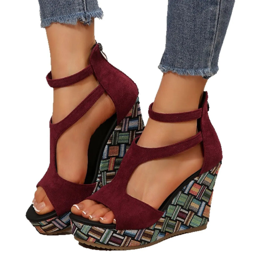 Women's cream white ankle-strap buckle sandals with thick rubber sole and cloth upper.