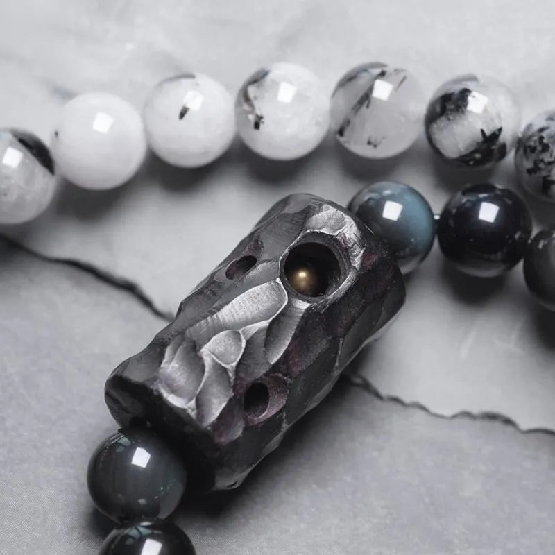 Ethnic black hair bracelet with white crystal tassel featuring bend and lace craftsmanship