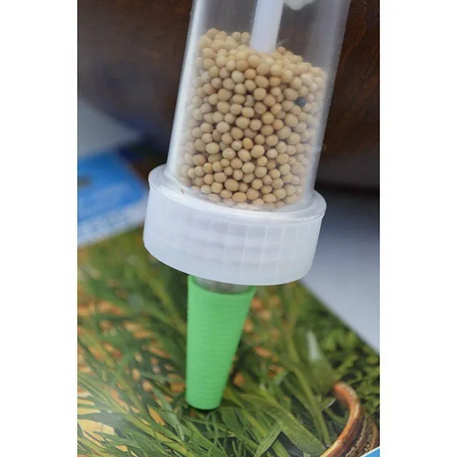 Plastic mini sower seed dispenser tool, 12cm length, for seeding pots and trays.