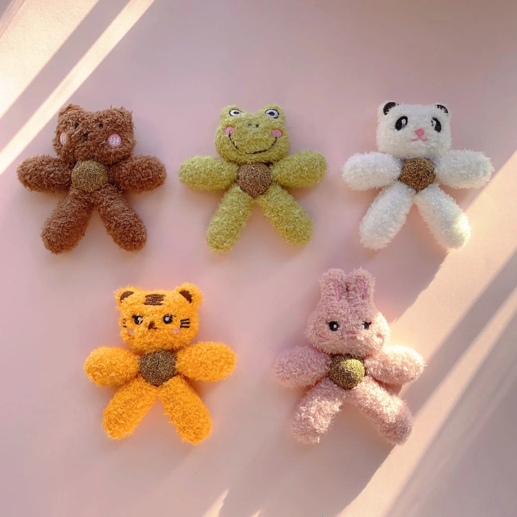 Interactive catnip ball toy with edible catnip stuffing for kitten dental care in character designs