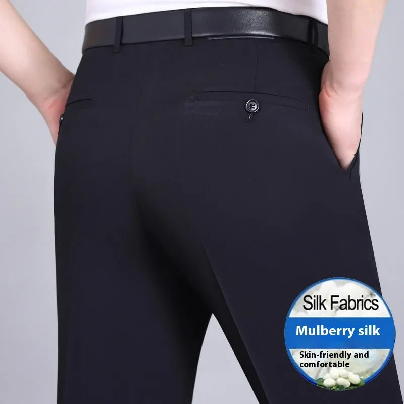 Men's straight-leg suit trousers in a mulberry silk blend fabric, shown in dark blue on a hanger.