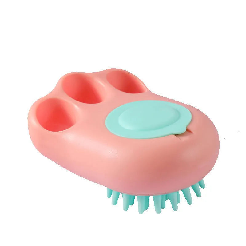 Blue silicone claw pet bath brush for washing cats and dogs on a white background.