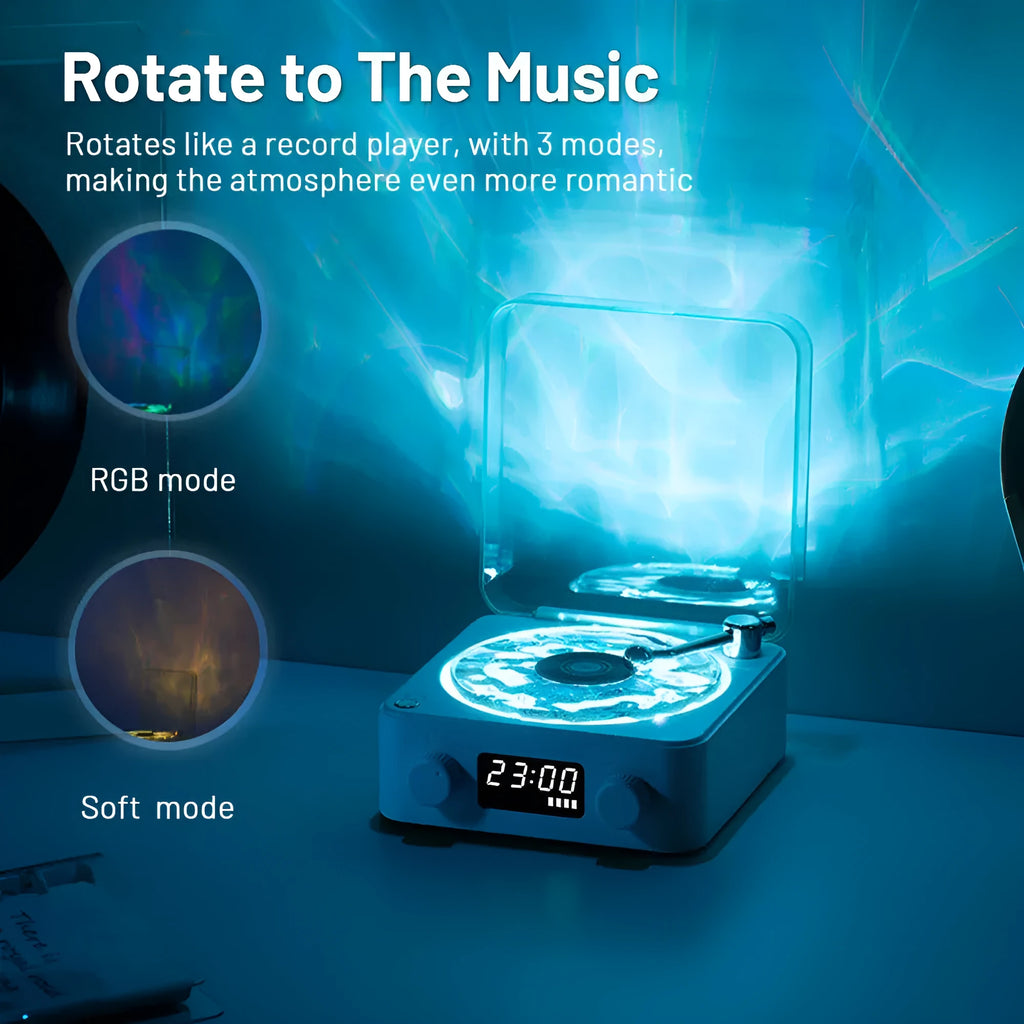 Blue retro-style Bluetooth speaker with rotating transparent turntable and RGB projection lighting