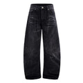 Black men's straight-leg jeans showing a cracked, washed denim finish on a plain background.