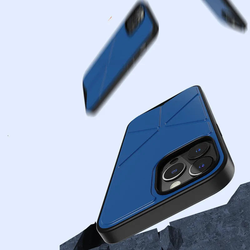 Black iPhone 13 Pro Max case with a built-in stand deployed on a table.