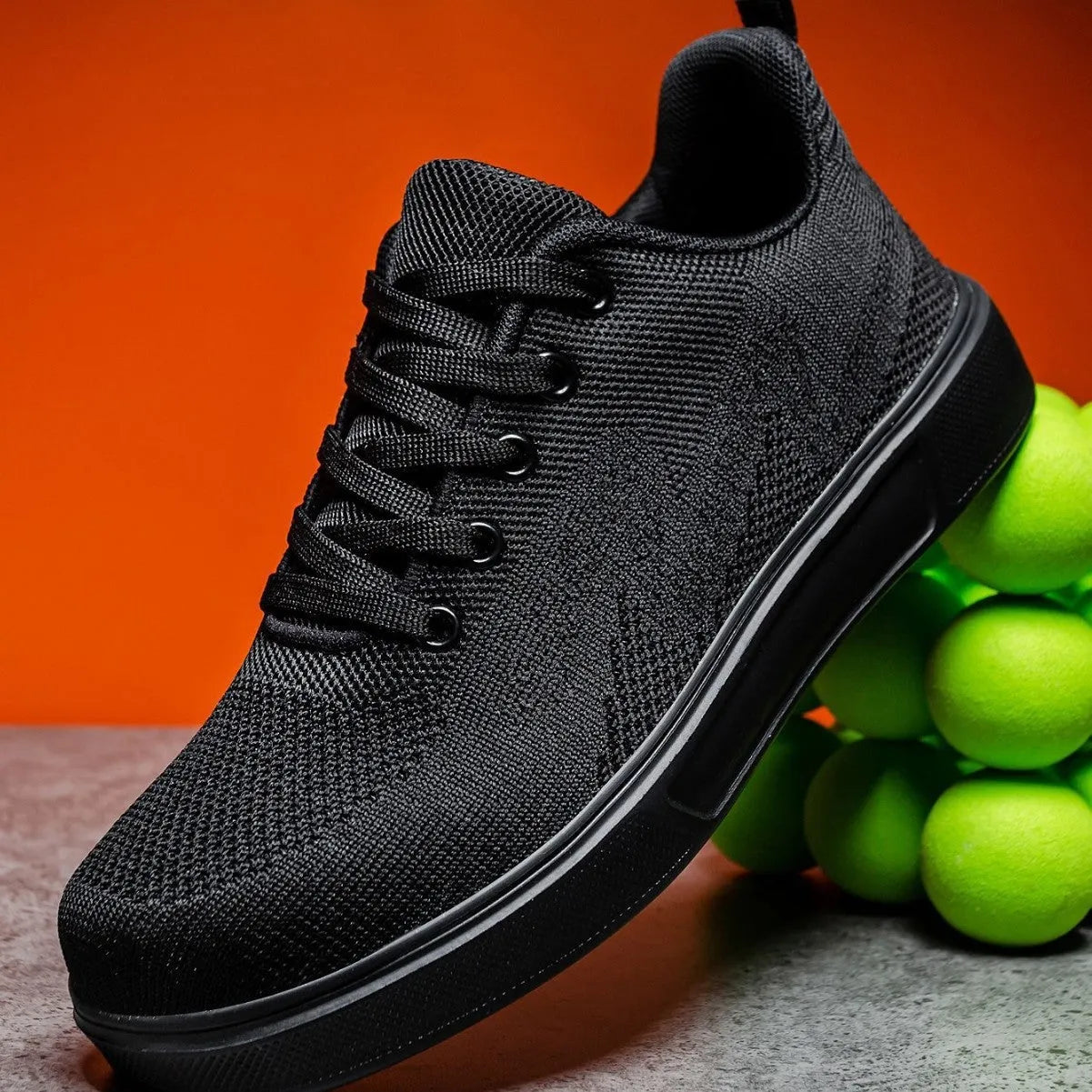 Light white and black mesh casual sneakers with flat EVA soles and round toes on a white background.
