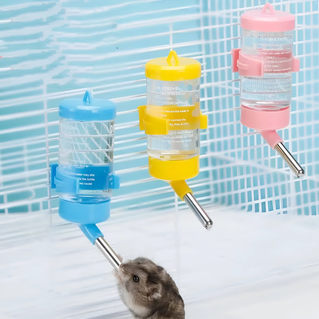 Green plastic ball kettle pet water feeder with a glass tube, showing the water filling capacity.