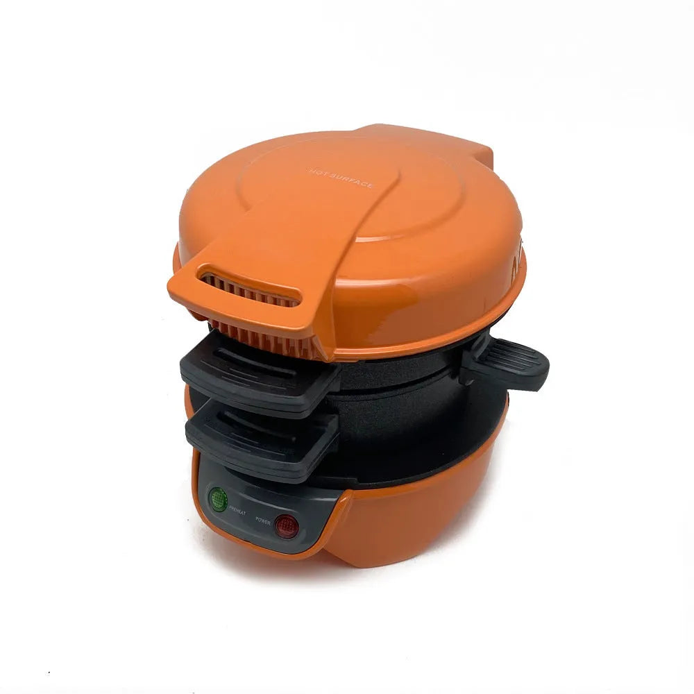 Bright red breakfast machine with egg cooker ring and sandwich plates on kitchen counter