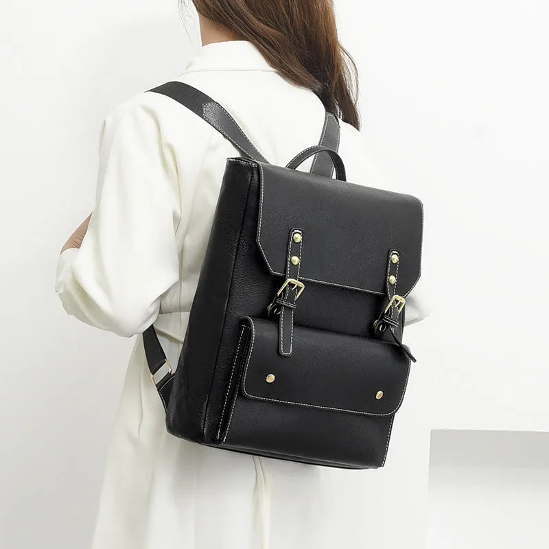 Retro-style soft PU backpack in brown colour, showing front design and straps.