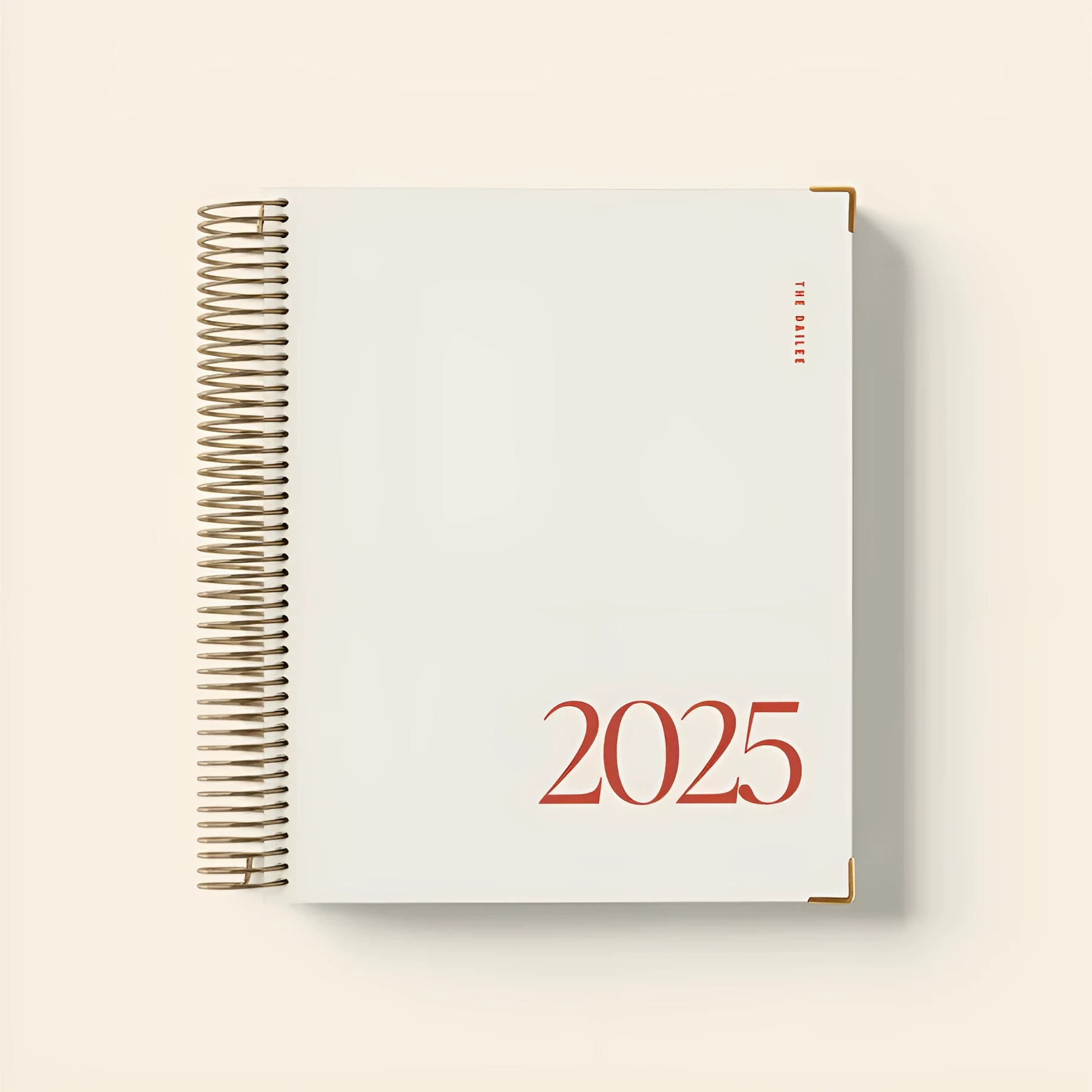 Cherry red A4 daily schedule coil notebook with hardback cover showing coil binding